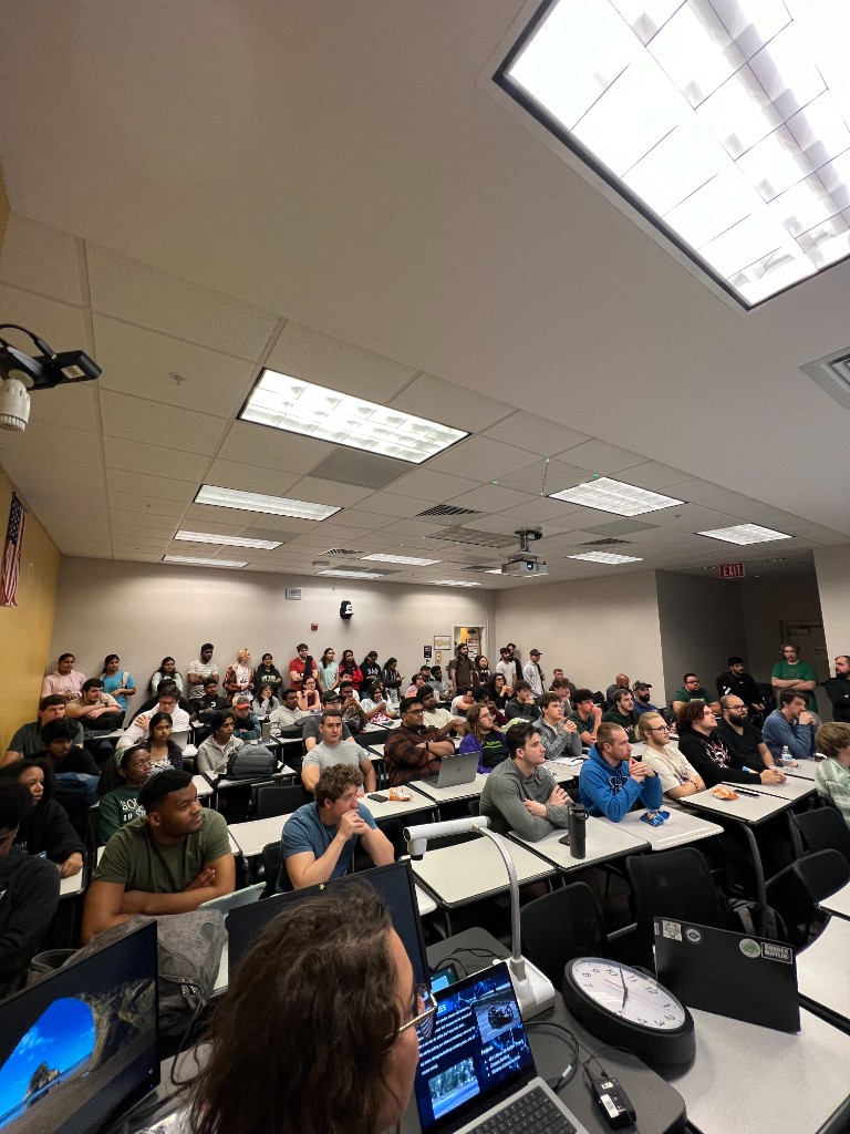 IEEE at USF students attending a packed professional development session