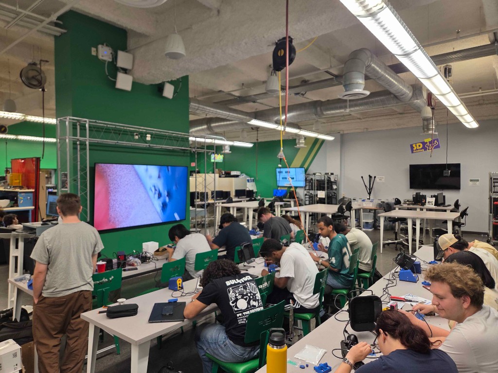 IEEE at USF students participating in a hands-on soldering workshop