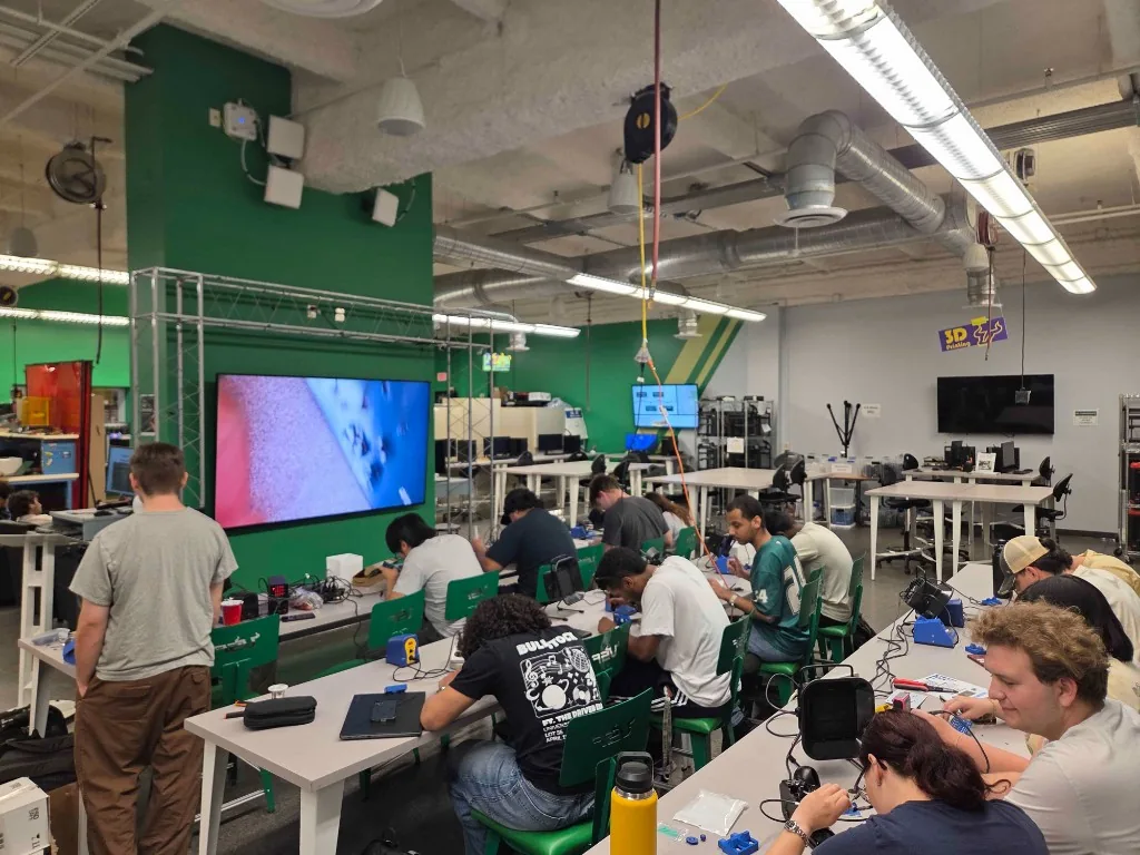 IEEE at USF students participating in a hands-on soldering workshop